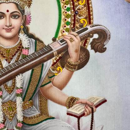 Artistic depiction of a figure holding a stringed instrument and a book, adorned with jewelry and traditional clothing.